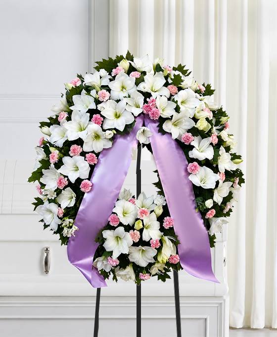 Corona funebre di fiori bianchi e rosa