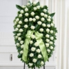 Cuscino funebre di rose bianche e verde di aspidistra